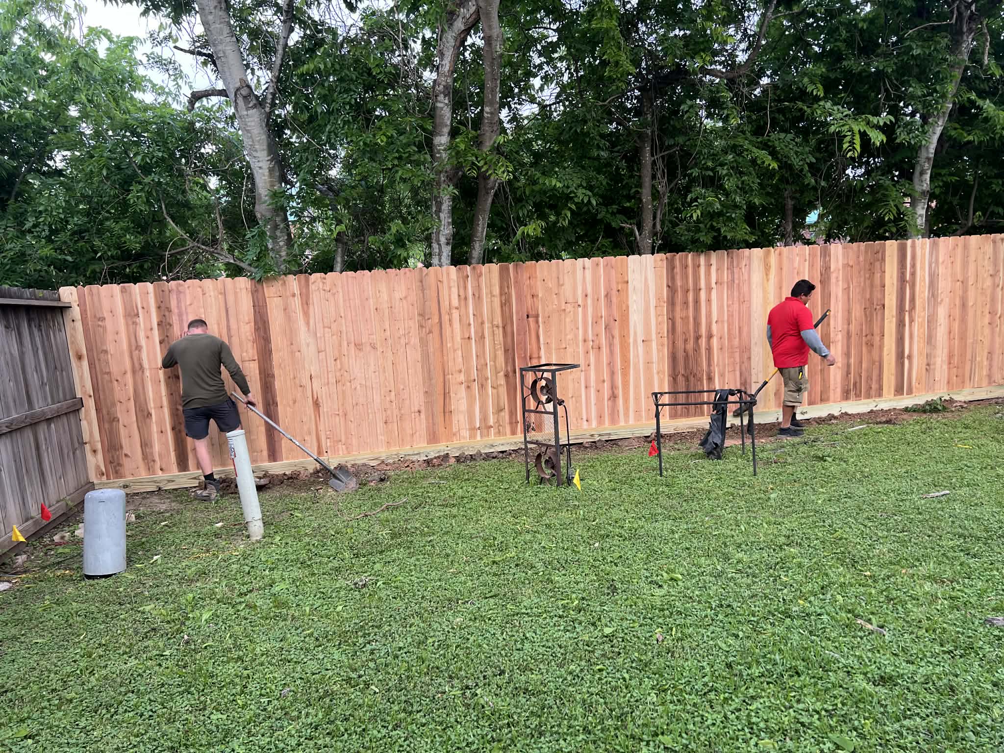 Wood Fence Installation in Progress